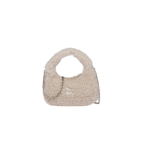 Miu Wander shearling mini hobo bag 